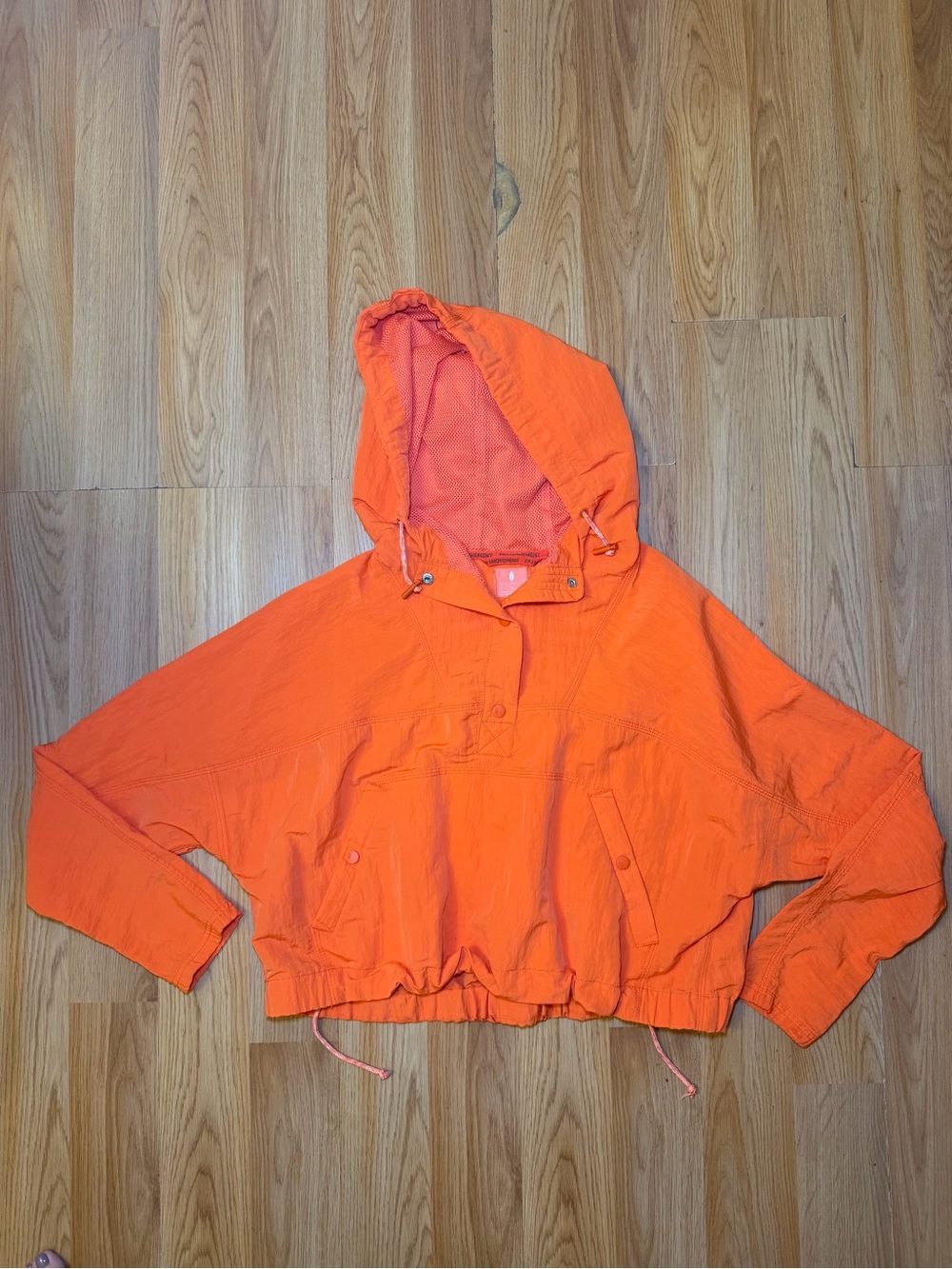 FP Movement by Free People Cropped Hooded Pullover Jacket in Bright Orange